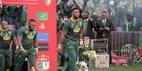 South Africa's flanker and captain Siya Kolisi enters the field during the first rugby union Test match between South-Africa and England at the Emirates Airline Park in Johannesburg on June 9, 2018. (Photo: GIANLUIGI GUERCIA / AFP)