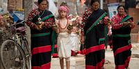 “The Young Priest.” A Young Priest from Thecho, Lalitpur carrying butter lamps on his head and on his palms during the Madhav Narayan festival celebration. © Dikpal Thapa, Nepal, Winner, National Awards, Lifestyle, 2022 Sony World Photography Awards