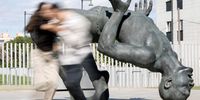 epa09167631 Dancers Victor Fernandez and Mayte Tortosa dance next to the 'Giant of Salt' sculpture by artist duo Coderch and Malavia to mark International Dance Day in Valencia, eastern Spain, 29 April 2021. The International Dance Day is observed worldwide on 29 April annually.  EPA-EFE/Ana Escobar