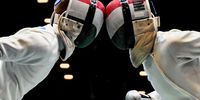 Tibor Andrasfi of Hungary (L) fights his compatriot Mate Coch in the men's individual epee best of 32 round at the FIE World Fencing Championship in Milan, Italy, 26 July 2023.  EPA-EFE/Tibor Illyes