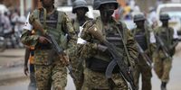 Army soldiers walk toward their positions as they stand guard against supporters of Kizza Besigye, the leader of the main opposition Forum for Democratic Change (FDC), at a busy intersection in Kampala, Uganda, 20 February 2016. Incumbent President Yoweri Museveni was declared the winner of the country's Presidential election on 20 February, extending his 30-year rule by winning 60.8 per cent of the vote while his main opponent Kizza Besigye won 35.4 per cent. Besigye, who was under house arrest as Museveni was declared the winner, has rejected the results and urged international community to do the same. The capital remained calm after the results announcement with heavy security presence.  EPA/DAI KUROKAWA