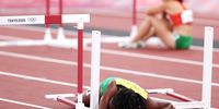 TOKYO, JAPAN - AUGUST 01: Yanique Thompson of Team Jamaica crashes into a hurdle during the Women's 100m Hurdles Semi-Final on day nine of the Tokyo 2020 Olympic Games at Olympic Stadium on August 01, 2021 in Tokyo, Japan. (Photo by Christian Petersen/Getty Images)