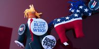 A voodoo doll of Donald Trump sits on the hood of a car during a drive-in campaign rally for Democratic presidential nominee Joe Biden at the Iowa State Fairgrounds on October 30, 2020 in Des Moines, Iowa. Biden is campaigning in Iowa, Wisconsin and Minnesota on Friday. (Photo by Drew Angerer/Getty Images)