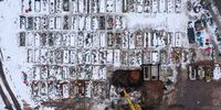 SUTTON COLDFIELD, ENGLAND - JANUARY 26:  An aerial drone view of recent burial chambers at Sutton New Hall Cemetery which has seen an increase in use after Handsworth Cemetery, where the section dedicated to the Muslim community has been used up faster, during the COVID-19 pandemic on January 26, 2021 in Sutton Coldfield, England. UK government figures indicate that people who have died with coronavirus in the UK has exceeded 100,000. (Photo by Christopher Furlong/Getty Images)