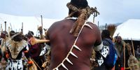 A warrior from amaHlubi performs during the annual umghubo wamaHlubi ceremony in eMahlutshini near Estcourt in KwaZulu Natal. The amaHlubi are in the process of reclaiming their kingship and language which were destroyed by a British proclamation in 1873. Photo: Lucas Ledwaba/Mukurukuru Media