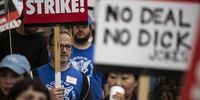 Members of the Writers Guild of America demonstrate in front of the Netflix building in Los Angeles, California, USA, 09 May 2023. Writers Guild members enter their second week of strikes after the deadline for a new ratified contract passed on 01 May, as agreements between the Alliance of Motion Picture and Television Producers (AMPTP) and the WGA were not reached on better wages and working conditions for writers.  EPA-EFE/ETIENNE LAURENT