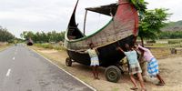 Fishermen shift a boat to a safer place in Teknuf, Cox’s Bazar district, Bangladesh, 13 May 2023. According to the Bangladesh Meteorology Department, Cyclone Mocha is expected to cross a part of Cox’s Bazar and Chattogram district. According to the Indian Met Department’s (IMD) and Bangladesh Meteorology Department (BMD) Cyclone Mocha is expected to make landfall around 14 May between Cox’s Bazar in Bangladesh and Kyaukpyu in Myanmar after a very severe cyclone storm.  EPA-EFE/STR