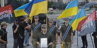 Comrades and friends of late British combat medic Peter Fouche attend a farewell ceremony for him on Independence Square (Maidan Nezalezhnosti) in Kyiv, Ukraine, 06 July 2024. Peter Fouche from the UK lived in London, where he worked as a policeman and a carpenter. He arrived in Ukraine in March 2022 as a volunteer and helped create a field hospital in Brovary near Kyiv. Peter was one of the founders of the 'Project Konstantin' charity foundation (named after one of the Britons fallen brothers-in-arms), which provided fast evacuation of soldiers after being wounded on the battlefield. In January 2024, Peter Fouche officially joined the Armed Forces as a combat medic. He died from a serious wound at the frontline.  EPA-EFE/SERGEY DOLZHENKO