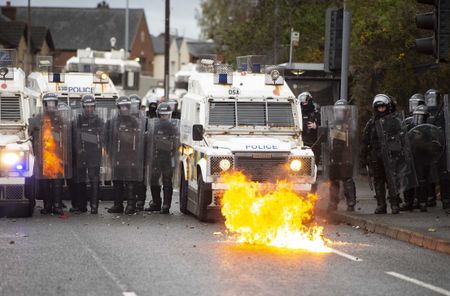 Northern Irish rioters attack police, torch houses for second night