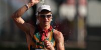 SAPPORO, JAPAN - AUGUST 06: Marc Mundell of Team South Africa pours water on himself while competing in the Men's 50km Race Walk Final on day fourteen of the Tokyo 2020 Olympic Games at Sapporo Odori Park on August 06, 2021 in Sapporo, Japan. (Photo by Clive Brunskill/Getty Images)
