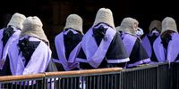 Members of the legal profession walk from Westminster Abbey after a service marking the start of the legal year, in London, U.K., on Friday, Oct. 1, 2021. Around 700 from the legal profession are invited to the annual service and breakfast, judges and senior lawyers wear ceremonial address to mark the occasion. Photographer: Betty Laura Zapata/Bloomberg via Getty Images