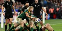 Faf de Klerk of South Africa passes the ball clear during the Rugby World Cup Final match between New Zealand and South Africa at Stade de France on October 28, 2023 in Paris, France. (Photo by David Rogers/Getty Images)