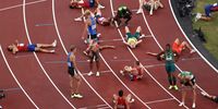 TOKYO, JAPAN - AUGUST 05:  Runners react after they compete in the Men's Decathlon 1500m on day thirteen of the Tokyo 2020 Olympic Games at Olympic Stadium on August 05, 2021 in Tokyo, Japan. (Photo by Ryan Pierse/Getty Images)