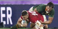  Eben Etzebeth (R) of South Africa tackles Dan Biggar (L) of Wales during the Rugby World Cup 2019 semi final match between South Africa and Wales at the International Stadium Yokohama in Yokohama City, Japan, 27 October 2019.  EPA-EFE/FRANCK ROBICHON