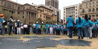 Picketers demanded that National Treasury increase taxes on the rich to fund another extension of the R350 grant. (Photo: Chris Gilili)