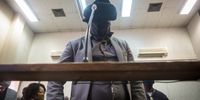 Simon 'Scorpion' Ndyalvane had his face covered by a mask as he stood in the dock. (Photo: Shiraaz Mohamed)