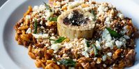 Beef shin youvetsi with roasted bone marrow and goat’s milk cheese. (Photo: Jan Ras Photography) 