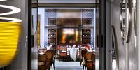 View of the main dining room through the lobby at Jean Georges'  The Mark restaurant in The Mark hotel in New York City