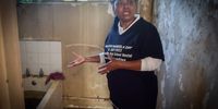 Acting matron Toinette Abrahams shows a bathroom at the Gelvandale High School hostel. (Photo: Deon Ferreira)
