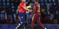 Jonathan Bairstow of England shakes hands with Akeal Hosein of West Indies after the team's victory in the ICC Men's T20 Cricket World Cup West Indies &amp; USA 2024 Super Eight match between England and West Indies at Daren Sammy National Cricket Stadium on June 19, 2024 in Gros Islet, Saint Lucia. (Photo by Robert Cianflone/Getty Images)