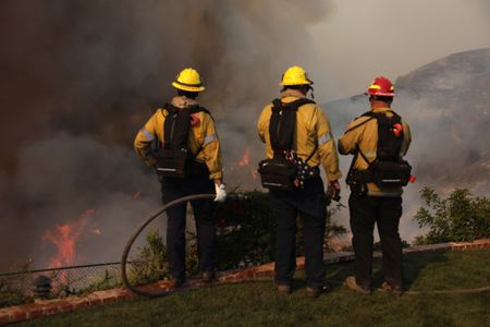 Los Angeles races to contain wildfires as severe winds return, 24 killed