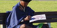 Artist at work. Sea Point Promenade, Cape Town. Image: Peter Reber