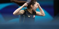 PARIS, FRANCE - JULY 29: Lily Zhang of Team United States celebrates after winning a Women's Singles Round of 32 match on day three of the Olympic Games Paris 2024 at South Paris Arena on July 29, 2024 in Paris, France. (Photo by Elsa/Getty Images)