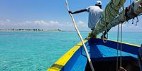 Dhow ride to an island beach. Photographer: Stelios Comninos