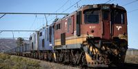 A Transnet SOC freight train stands idle with wagons loaded with coal in a rural area on 2 October 2023, south of Leeu Gamka, South Africa. (Photo: Per-Anders Pettersson/Getty Images)