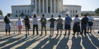 A group of people pray as the Supreme Court starts a new term at the Supreme Court in Washington, DC, USA, 02 October 2023. Already on the docket for the year are cases on gun rights, free speech on social media and affirmative action in selection of students at one of the nations top secondary schools Thomas Jefferson High School for Science and Technology in Northern Virginia. EPA-EFE/SHAWN THEW