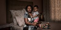 Monthla Ngobeni with her daughter, Thetho, at home in Polokwane, Limpopo. Montlha is the first named claimant in the listeriosis class action. Thetho was born with severe health complications due to contracting listeriosis in the womb. (Photo: Thom Pierce)