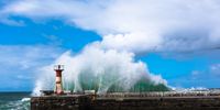 Storm surge over Kalk Bay Harbour wall. Photographer: Neville Lance
