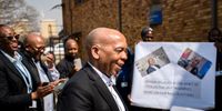 Electricity and Energy Minister Kgosientsho Ramokgopa (centre) arrives to a warm greeting from  Eskom Kendal Power Station employees in Mpumalanga. (Photo: Julia Evans)