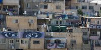 epa10139739 Murals depicting the eyes of 'witnesses' are painted to the walls of houses in the east Jerusalem neighborhood of Silwan, 26 August 2022. The paintings are part of a public art project called 'I Witness Silwan' that aims at drawing attention to home demolitions and displacement of local residents. According to a media release by the organizers, the Jerusalem-based Madaa-Silwan Creative Center and the USA-based Art Forces, the 'multi-site installation features large murals of eyes - of philosophers, activists, and artists - meant to convey that the world is bearing witness and that eyes are on Silwan'. The murals that were installed with the support of the Residents Council of Batn al Hawa since 2018 and created by local and diasporic Palestinian artists, international artists and local Silwan youths shall also highlight global police violence and include depictions of what resembles the eyes of US police violence victims George Floyd and Alex Nieto as well as those of Iyad al Hallaq, a young Palestinian with autism who was killed by Israeli police in Jerusalem on 30 May 2020.  EPA-EFE/ATEF SAFADI  ATTENTION: This Image is part of a PHOTO SET