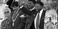 May 1996: The signing of the Constitution of the Republic of South Africa in May 1996 ushered in a new era of constitutional democracy two years after the country’s historic first democratic election and the installation of President Nelson Mandela.  In this photograph Frene Ginwala, Cyril Ramaphosa holding aloft  the signed copy of the Constitution and Nelson Mandela.(Photo: Gallo Images/ Business Day / Robert Botha)