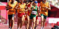 Louzanne Coetzee and her guide, Erasmus Badenhorst of South Africa in the final of the women's 1500m T11 during the morning session of the Athletics on Day 6 of the Tokyo 2020 Paralympic Games at the Olympic Stadium on August 30, 2021 in Tokyo, Japan. Coetzee and Badenhorst went on to win the silver medal. (Photo by Roger Sedres/Gallo Images)