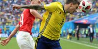  Josip Drmic (L) of Switzerland and Victor Lindelof of Sweden in action during the FIFA World Cup 2018 round of 16 soccer match between Sweden and Switzerland in St.Petersburg, Russia, 03 July 2018. EPA-EFE/TOLGA BOZOGLU 