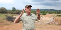 Chris Ransome explains the dropping of the fences to allow elephants to roam between farms creating a safe haven for wildlife. (Photo: Felix Dlangamandla)