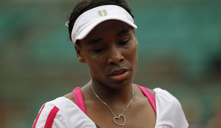Venus joins Serena in early French Open exit