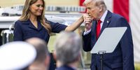 epa12369632 US President Donald J. Trump (R) kisses the hand of First Lady Melania Trump (L), following his remarks during a ceremony to commemorate the 24th anniversary of the 9/11 terror attack at the Pentagon in Arlington, Virginia, USA, 11 September 2025. President Trump commented on the death of rightwing activist Charlie Kirk, saying the he will posthumously award him with the Presidential Medal of Freedom.  EPA/SHAWN THEW