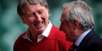 JPR Williams (l) chats to Gareth Edwards as a host of former Welsh Internationals were invited to watch the Wales team train at The Millennium Stadium on November 6, 2008 in Cardiff, Wales.  (Photo: Stu Forster/Getty Images)