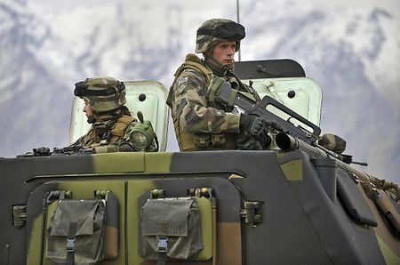 Trump lashes NATO allies as he lands for tense summit