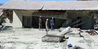 Residents go through what is left of their houses in Charlesville, Jagersfontein after the tailings dam burst. (Photo: Felix Dlangamandla)