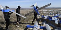 epa11913346 Ukrainian developers handle Besomar 3210 unmanned aerial vehicle (UAV) systems during their handover to the Ukrainian army at an undisclosed location in the Lviv region, western Ukraine, 21 February 2025, amid the Russian invasion. The 100 units of UAV systems, ground control stations, and launch and control equipment were handed over to the representatives of the 1020th Airborne Defence Unit and the 39th Airborne Defence Unit of the Armed Forces of Ukraine. The Besomar 3210 UAVs are aircraft-type strike interceptor drones designed for additional reconnaissance, interception, and destruction of enemy reconnaissance (Orlan, Supercam, Zala) and attack (Shakhed, Geran) drones. The systems include aircraft-type drones, ground control stations, mobile charging stations, antennae, and radio beacons. The drones can stay in the air for up to two and a half hours, ascend to an altitude of up to four kilometers, and travel at a speed of 160 kph with a flight range of 50-60 km.  EPA-EFE/MYKOLA TYS
