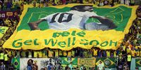 epaselect epa10350658 Fans of Brazil show a banner with which they wish Pele all the best during the FIFA World Cup 2022 round of 16 soccer match between Brazil and South Korea at Stadium 974 in Doha, Qatar, 05 December 2022.  EPA-EFE/Abedin Taherkenareh