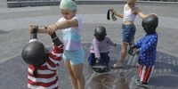  Youngsters regard the monument 'Children, the founders of Kyiv' which was dressed with elements of the US national flag, in Kyiv, Ukraine, 04 July 2024 to mark American Independence Day.  EPA-EFE/SERGEY DOLZHENKO