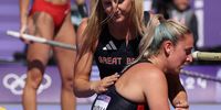 PARIS, FRANCE - AUGUST 05: Molly Caudery of Team Great Britain consoles Holly Bradshaw of Team Great Britain during Women's Pole Vault Qualification on day ten of the Olympic Games Paris 2024 at Stade de France on August 05, 2024 in Paris, France. (Photo by Michael Steele/Getty Images)