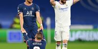 Kylian Mbappe of Paris Saint-Germain (L) interacts with teammate Marco Verratti as Nacho Fernandez of Real Madrid (R) celebrates following the UEFA Champions League Round Of Sixteen Leg Two match between Real Madrid and Paris Saint-Germain at Estadio Santiago Bernabeu on March 09, 2022 in Madrid, Spain. (Photo by David Ramos/Getty Images)