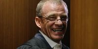 Prosecutor Gerrie Nel smiles during the murder trial of paralympian Oscar Pistorius at the High Court in Pretoria, South Africa, 08 July 2014. Pistorius is charged with murdering his girlfriend Reeva Steenkamp on Valentine's Day last year. The athlete claims he shot her by accident through the locked door of the toilet in his Pretoria home, thinking she was an intruder about to emerge and attack him.The State contends he killed her during an argument. The State would file its heads of argument on July 30, and the defence on August 4. Argument would then be heard in court on 7 and 8 August 2014.  EPA/SIPHIWE SIBEKO / POOL