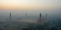 The Badshahi Mosque is shrouded in smog in Lahore, Pakistan, on Friday, Dec. 3, 2021. The city of more than 11 million people in Punjab province near the border with India consistently ranks among the worst cities in the world for air pollution. Photographer: Asad Zaidi/Bloomberg via Getty Images